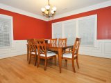 Custom paneled wainscot and snappy red paint