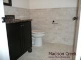 Marble floor tile, travertine wainscot